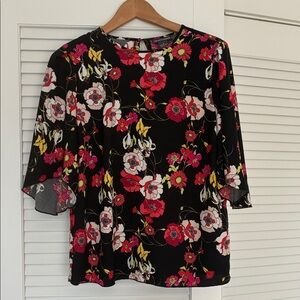 Chelsea in Theodore size medium women's floral blouse.